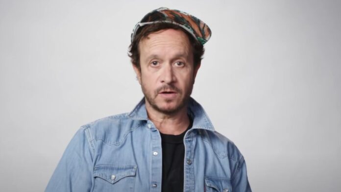 Pauly Shore wearing hat in Tales from the Trip